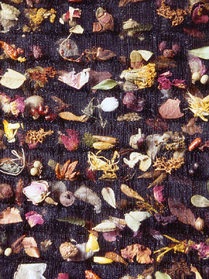 Fabric containing all manner of natural materials - herbs, flowers, seeds and so on.