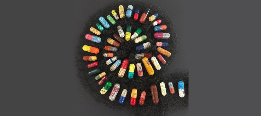 A spiral of pills in fabric